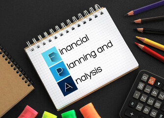 Poster - fpa - financial planning and analysis acronym on notepad, business concept background