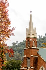 Wall Mural - Vertical shot of the Anglican brick church in small town, Victoria, Australia