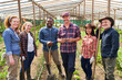 © Robert Kneschke - Group of farmers in greenhouse as farming collective