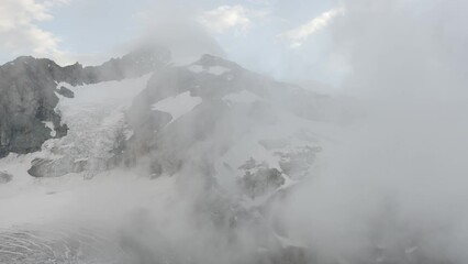 Wall Mural - Beuatiful shot of rocky mountains covered with snow