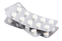 Stack Of Blister Packs With Round Pills On A White Isolated Background