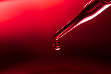 Wall Mural - macro science experiment pipette surface, top macro view of chemical droplet injecting oil into clea