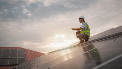 Wall Mural - service engineer checking solar cell on the roof for maintenance if there is a damaged part. enginee