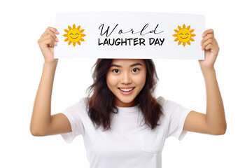 Wall Mural - A woman holding up a sign that says world laughter day. Generative AI.