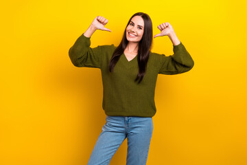 Sticker - Photo of shiny adorable woman dressed khaki sweater pointing thumbs herself isolated yellow color background