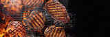 Fototapeta Tulipany - top view of the grill, juicy steaks are fried on the grill