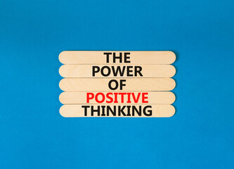 Wall Mural - Positive thinking symbol. Concept words The power of positive thinking on wooden stick. Beautiful blue table blue background. Business, motivational positive thinking concept. Copy space.