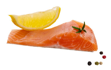 Wall Mural - A raw piece of red fish fillet (trout, salmon) with a slice of lemon isolated on transparent background png. seafood with pepper mix 