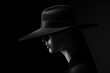 A woman wearing a big black hat in the dark isolated on a black background Generative Ai