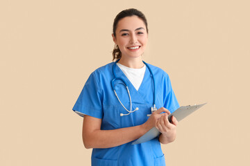 Sticker - Female medical assistant with clipboard on beige background