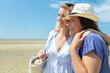 © auremar - two women embracing on the beach