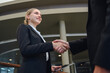 © เลิศลักษณ์ ทิพชัย - ฺBusiness woman shaking hands with manager After signing contracts and in the office Handshake of successful business people