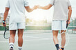 © Clement C/peopleimages.com - Man, hands and fist bump in tennis for teamwork, sports motivation or competitive game on the court. Hand of men touching fists in team player respect, support or sport training for fitness workout