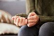 © Siphosethu F/peopleimages.com - Hands, anxiety and closeup of a woman with depression, mental health problem and stress in home lounge. Female person on a couch for psychology, fear and abuse on a sofa while sad or depressed