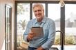 © Oostendorp/peopleimages.com - Portrait, man and real estate agent with tablet in home for property sale online. Senior, realtor and face smile of person, entrepreneur or male professional from Canada with pride for career or job