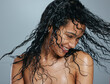 © Kirsten D/peopleimages.com - Wet hair, happiness and woman beauty after shower dancing from haircare and wellness. Young female model, smile and dance with happy face and dermatology from grooming care and shampoo treatment