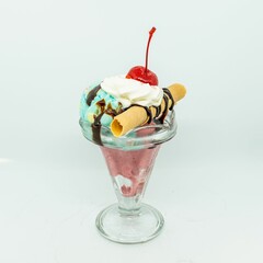 Sticker - Gourmet delicious ice cream sundae isolated on a white background