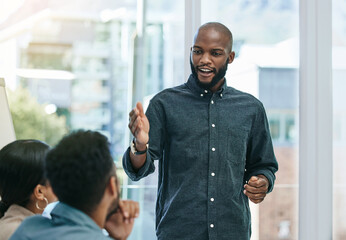 Poster - Presentation, planning and training with black man in business meeting for motivation, mentor and leadership. Teamwork, conference and speaker with employee in workshop for mission, project and idea