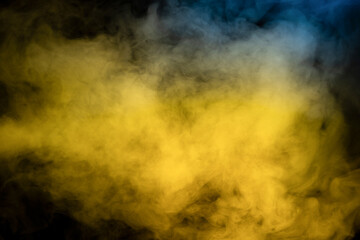 Blue and yellow steam on a black background.