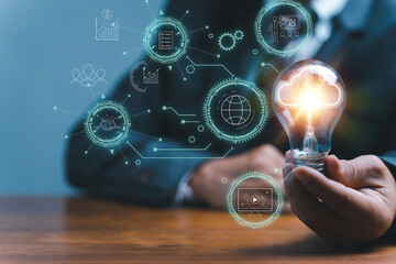 Poster - man Hand holding Light bulb Global Internet connection. Business global internet connection application technology and digital marketing, Financial and banking, Digital link tech, big data.
