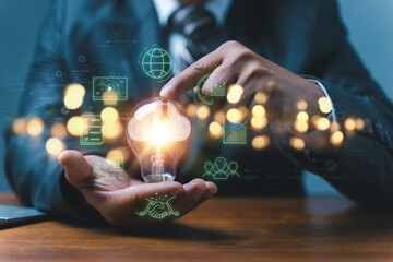 Poster - man Hand holding Light bulb Global Internet connection. Business global internet connection application technology and digital marketing, Financial and banking, Digital link tech, big data.