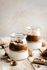 jar of chocolate , yogurt and hazelnut