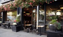  A Restaurant With Tables And Chairs Outside And Flowers Hanging From The Windows And A Car Parked In The Street In Front Of The Restaurant Door.  Generative Ai