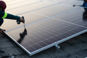 Technician fixing and assembling solar panels