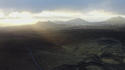 Poster - Aerial slow movement around greenery mountain landscape during sunset