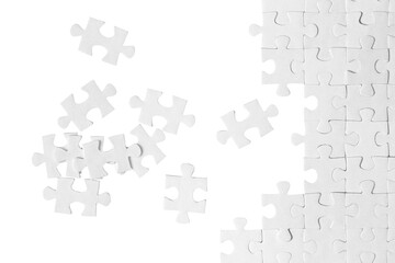 white puzzle pieces, cut out
