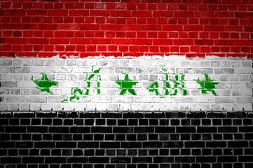 Sticker - The Iraq flag painted on a brick wall in an urban location