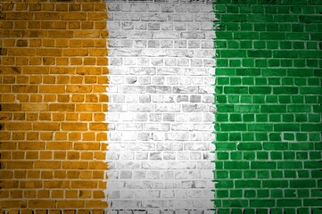 Canvas Print - The Ivory Coast flag painted on a brick wall in an urban location