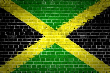 Sticker - Jamaica flag painted on a brick wall in an urban location