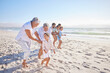 © Alexis Scholtz/peopleimages.com - Vacation, travel and big family running on the beach for playing, bonding and spending quality time. Happy, excited and children having fun with their grandparents and parents by the ocean on holiday