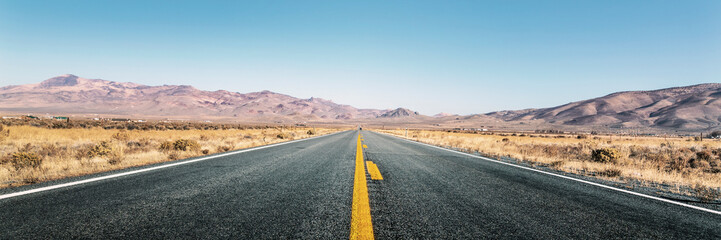 Sticker - Panoramic view of an empty straight highway in desert