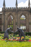Liverpool, united kingdom May, 16, 2023 The sculpture All Together Now by Andy Edwards outside the bombed out church of St John's in Liverpool