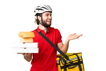 Wall Mural - Young delivery man with thermal backpack over isolated chroma key background with surprise facial expression