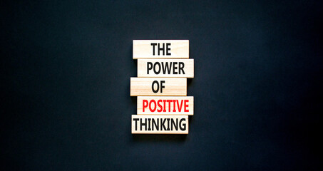 Wall Mural - Positive thinking symbol. Concept words The power of positive thinking on wooden block. Beautiful black table black background. Business, motivational positive thinking concept. Copy space.