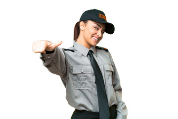 Poster - Young safeguard woman over isolated chroma key background giving a thumbs up gesture