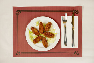 Wall Mural - Croquettes are a portion of dough that can have different shapes