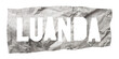 Luanda city name cut out of crumpled newspaper in retro stencil style isolated on transparent background