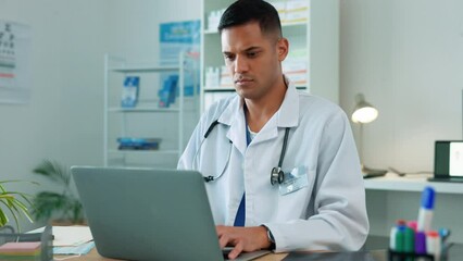 Poster - Doctor, man and laptop in cardiology research typing or browsing healthcare results or communication on desk. Male medical professional working on computer for online health search, study or planning