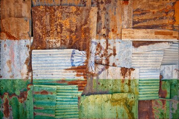 Sticker - Flag of India on rusty corrugated iron sheets forming a wall or a fence