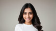 © Dawid - Young Hindus woman with long, wavy hair on natural background with mockup. Generative AI.