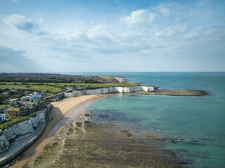 Canvas Print - Scenic view of the sea featuring coastal houses in summer