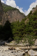 Sticker - Vertical shot of the Samaria Gorge during the day in Crete, Greece