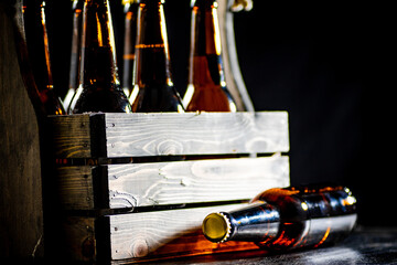 Wall Mural - Old box with beer bottles.