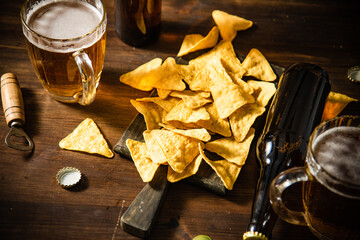 Wall Mural - Fresh beer with corn chips.