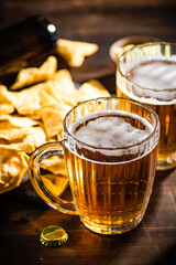 Wall Mural - Fresh beer with corn chips.