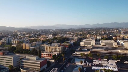 Sticker - Aerial shot of downtown Los Angeles with buildings and cars driving on the road